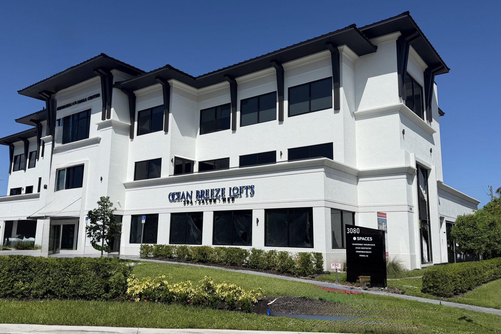 Ocean Breeze Lofts — Spa · Salon · Med signage at 3080 Tamiami Trail E, Naples, FL