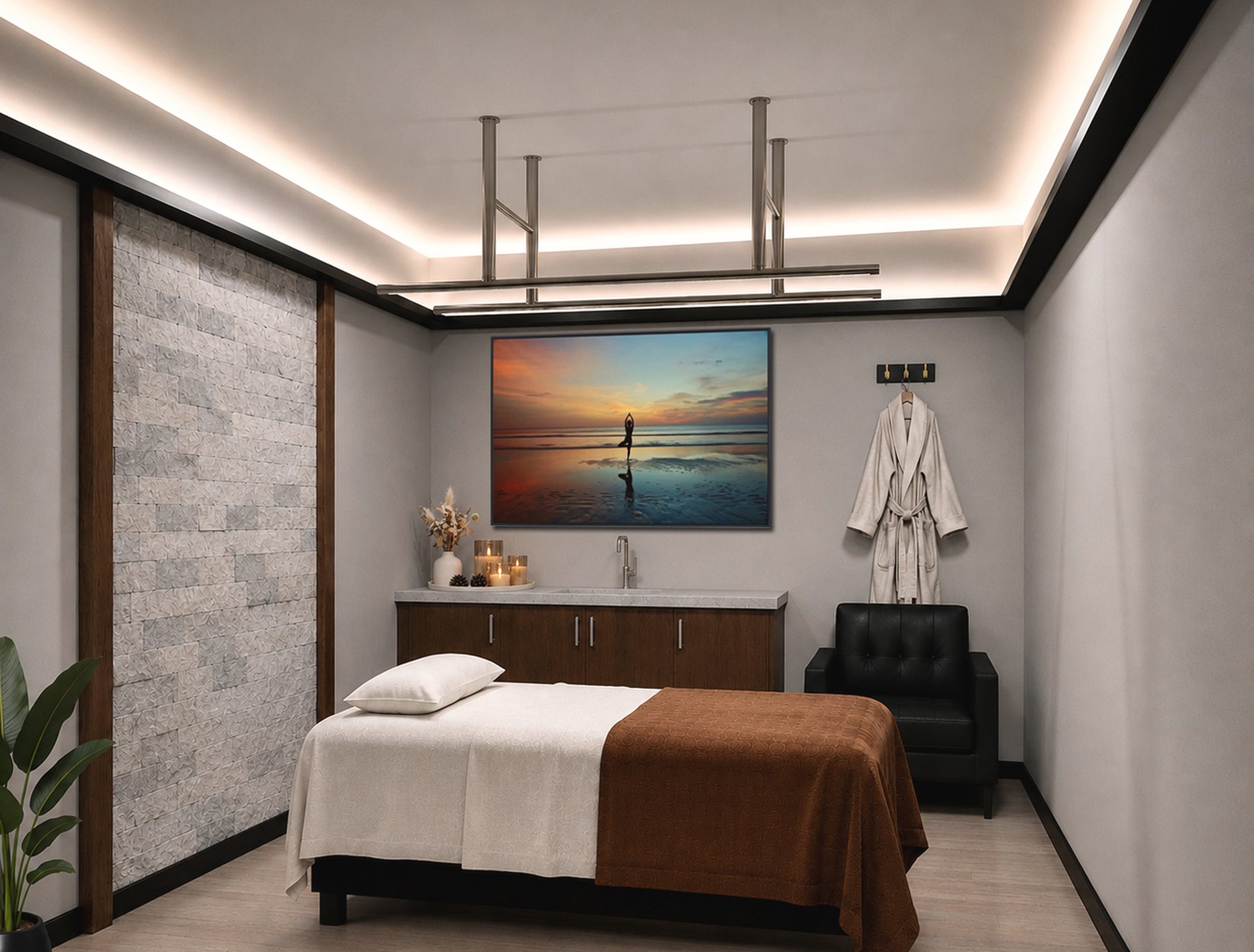 Spa suite rendering — treatment table, walnut cabinetry with sink, stone accent wall, cove lighting and robe hooks
